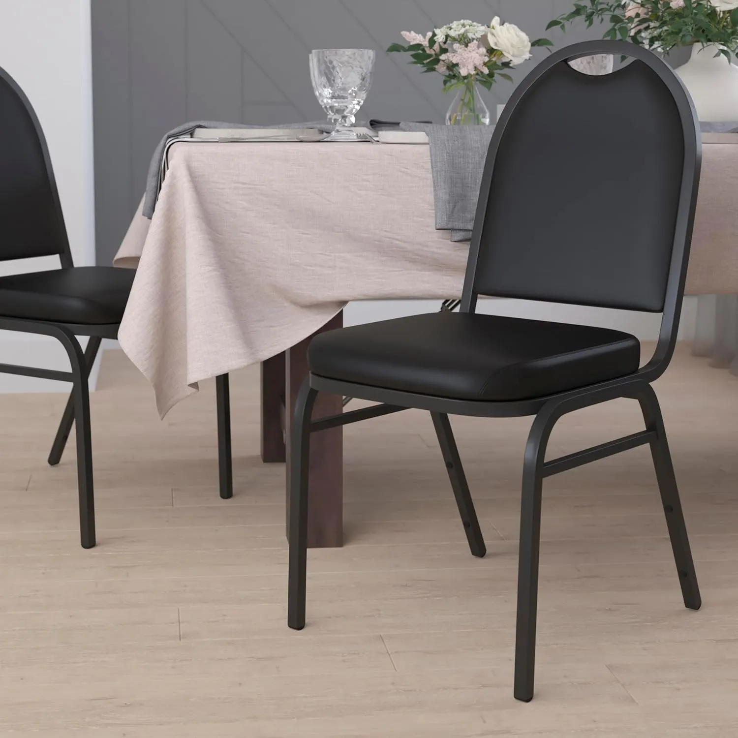 Flash Furniture HERCULES Set of 4 Commercial Grade 500 LB. Capacity Dome Back Stack Chairs - Black Vinyl Upholstery - Black Metal Frames - Built-In Handle